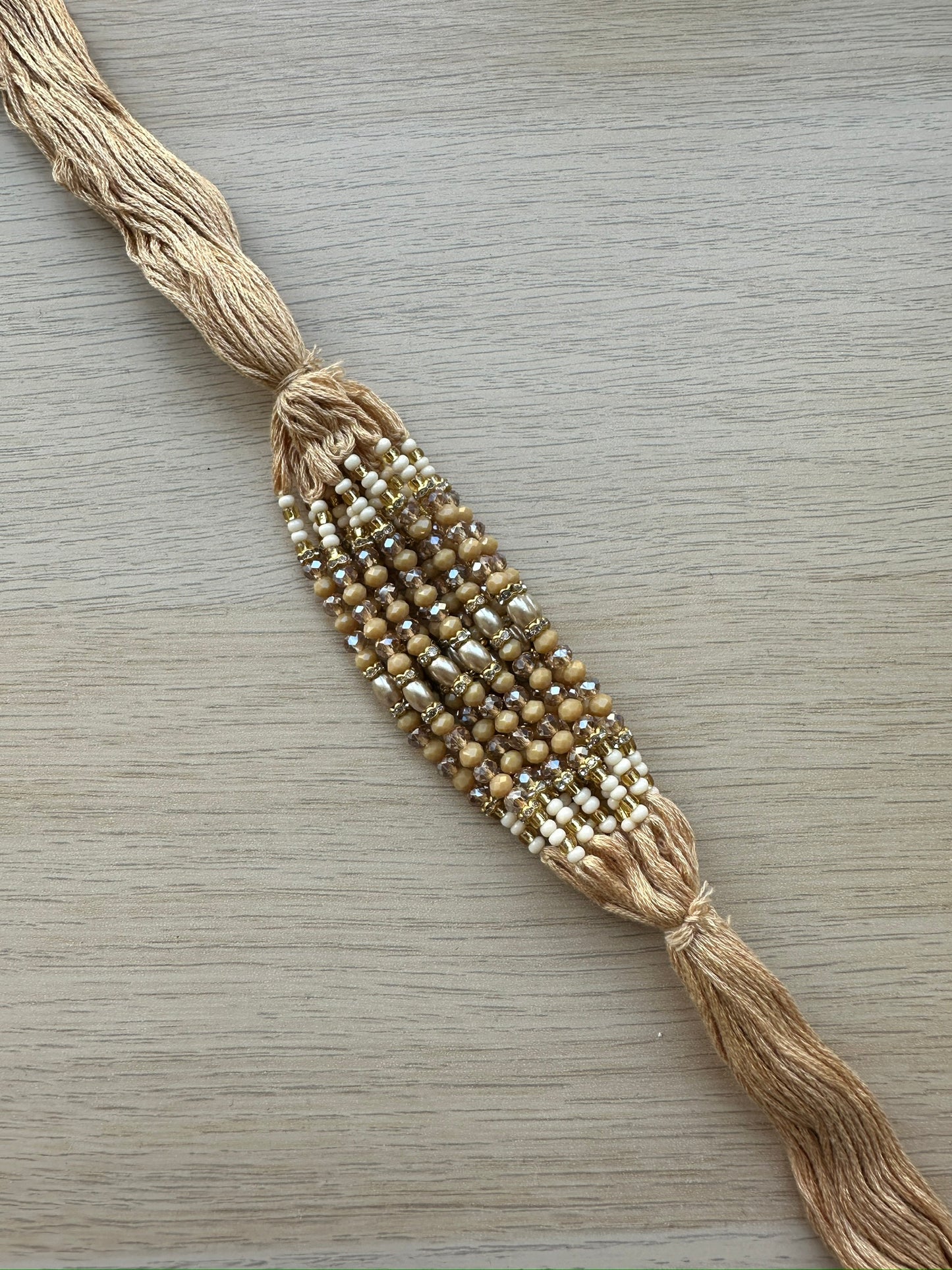 raksha bandan, rakhi, rakhri, nude string, champagne stones, nude stones, iridescent stones, white stones