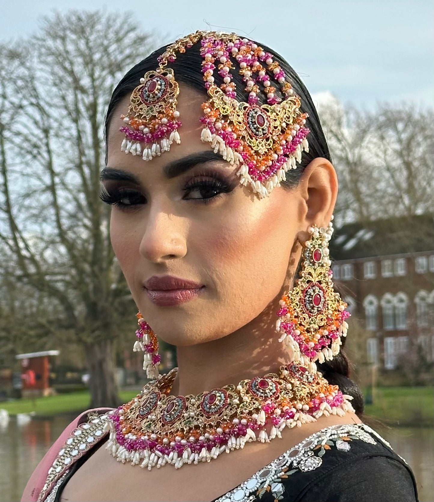 asian jewellery indian jewellery multicolour colourful mehndi mendi mehendi henna necklace set with earrings tikka passa jhoomar and saharey. Contains white pearls, magenta, orange, blue colours on a gold base