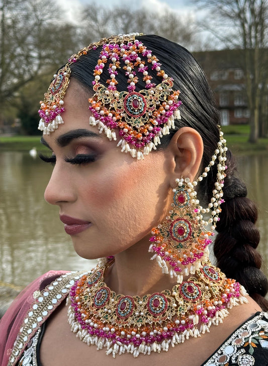 asian jewellery indian jewellery multicolour colourful mehndi mendi mehendi henna necklace set with earrings tikka passa jhoomar and saharey. Contains white pearls, magenta, orange, blue colours on a gold base 